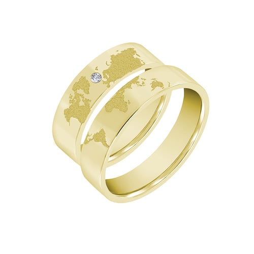 Goldene Trauringe mit Gravur der Weltkarte und Diamant Zeoni