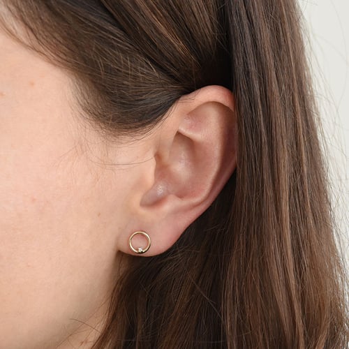 Goldene Karma Ohrstecker mit Diamanten Abner
