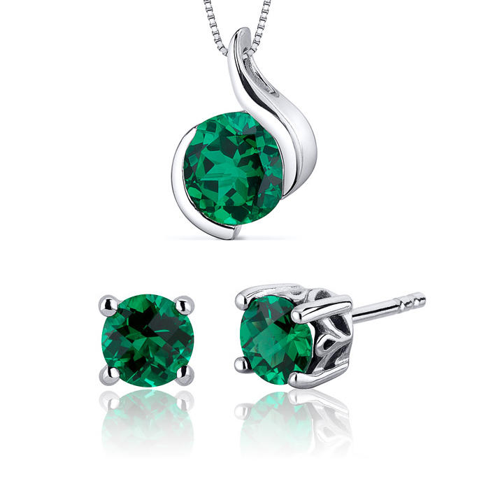 Silberne Kollektion mit simulierten Smaragden Bel