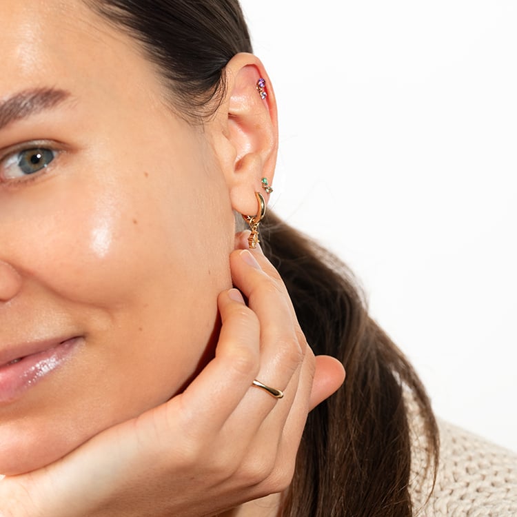 Goldener Piercingstecker mit Smaragden Dyre 149178