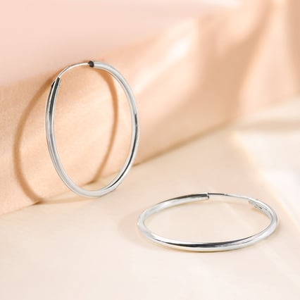 Goldene runde Ohrringe Banks