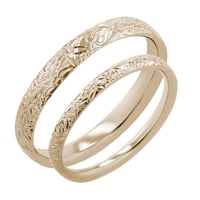 Eheringe mit Blumengravur aus Haselnussgold Willis