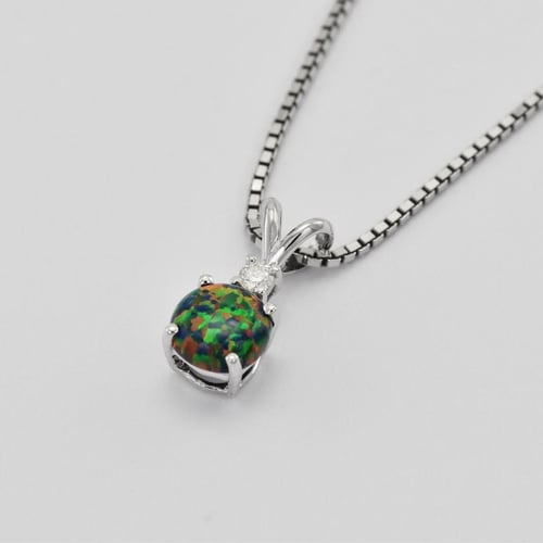 Schwarzes Schmuckset mit Opalen aus Gold Vanna