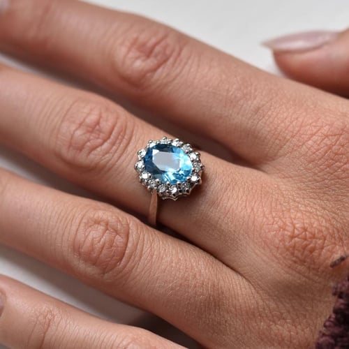 Ring mit blauem Topas und Diamanten Chrys