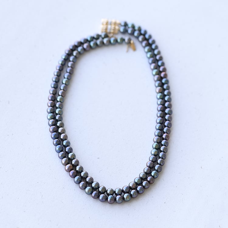 Goldene Perlenkette mit schwarzen Perlen Idhitri 58836