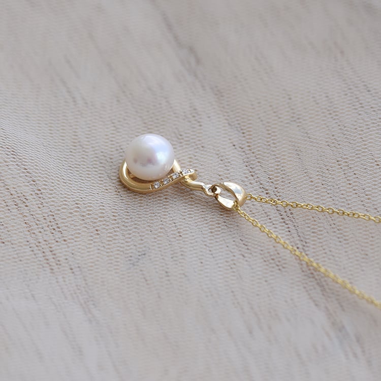 Anhänger aus Gold mit Perle 64447