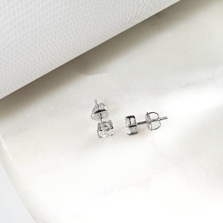 Ohrringe mit Diamanten und vier Krappen Christi 132862