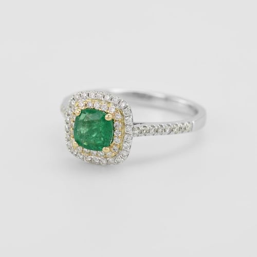 Ring aus zwei Goldarten mit Smaragd und Diamanten Vicente