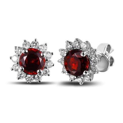 Goldene Ohrringe mit Diamanten und Granaten Walvia