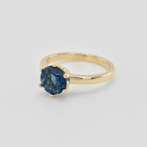 Goldener Verlobungsring mit Londontopas Mukti