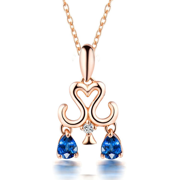 Goldene Halskette mit Saphir