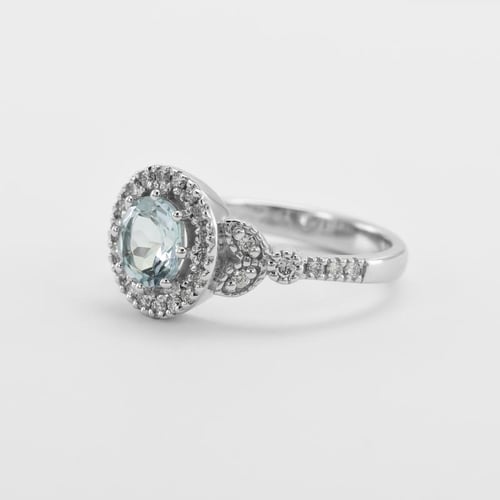 Verlobungsring im Halo-Stil mit Aquamatin und Diamanten Varana