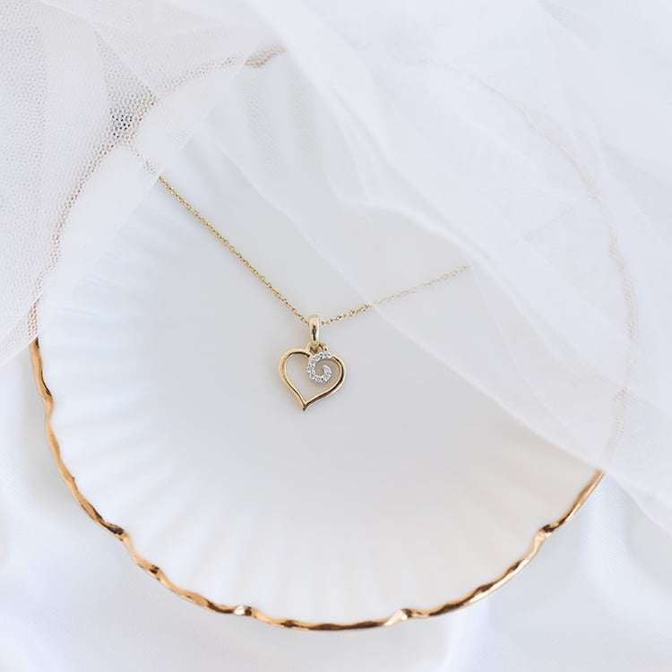 Goldener Anhänger in Herzform mit Diamanten Emeka 93654