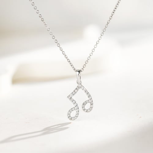 Anhänger aus Gold mit Lab Grown Diamanten in Form einer Note Ariel