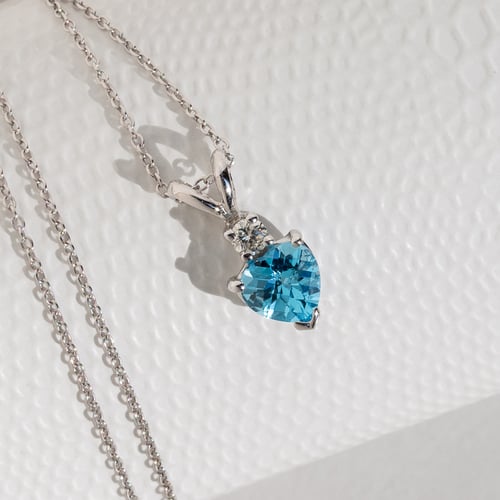 Goldanhänger mit Topas und Diamanten Dorevie