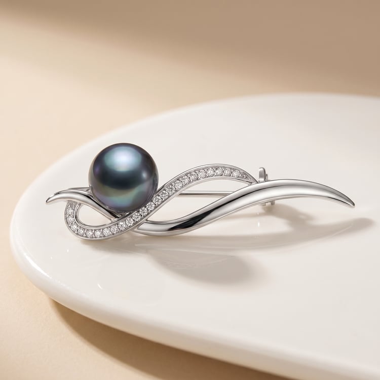 Silberne Brosche mit schwarzer Perle und Zirkonia Otmar 167806