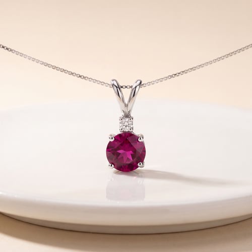 Goldener Rubinanhänger mit Diamant Emolyna