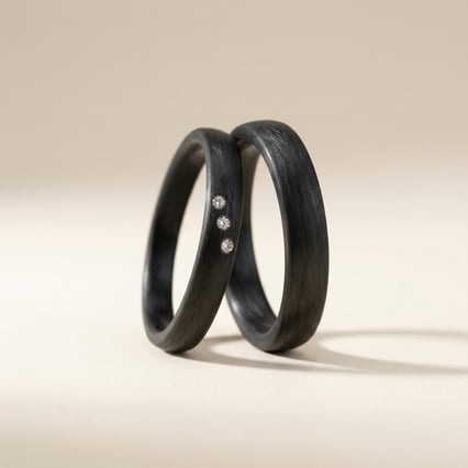 Eheringe aus Carbon mit Diamant Jennie