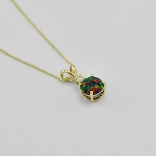Schwarzes Schmuckset mit Opalen aus Gold Vanna