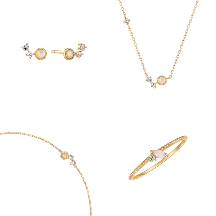 Goldenes Schmuckset mit Opalen