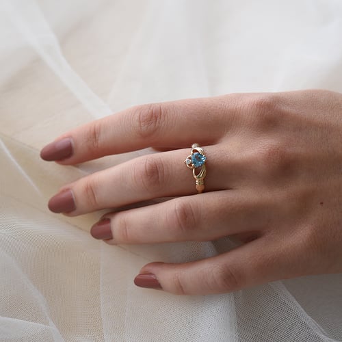 Goldener Claddagh-Ring mit Topas und Diamant Norie