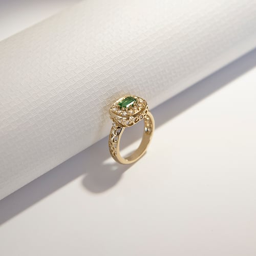 Goldring mit Smaragd und Diamanten Mare