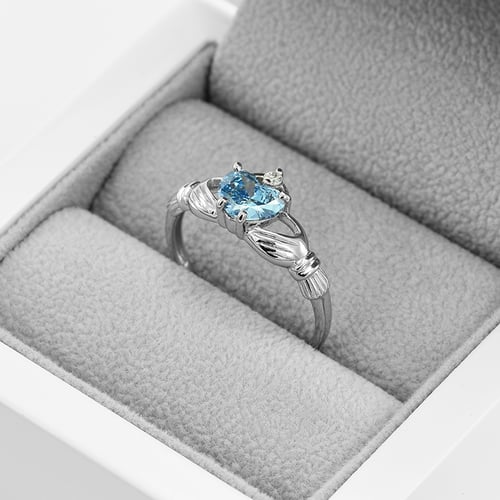 Goldener Claddagh-Ring mit Topas und Diamant Norie