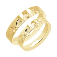 Eheringe mit einer Wellengravur Carlin