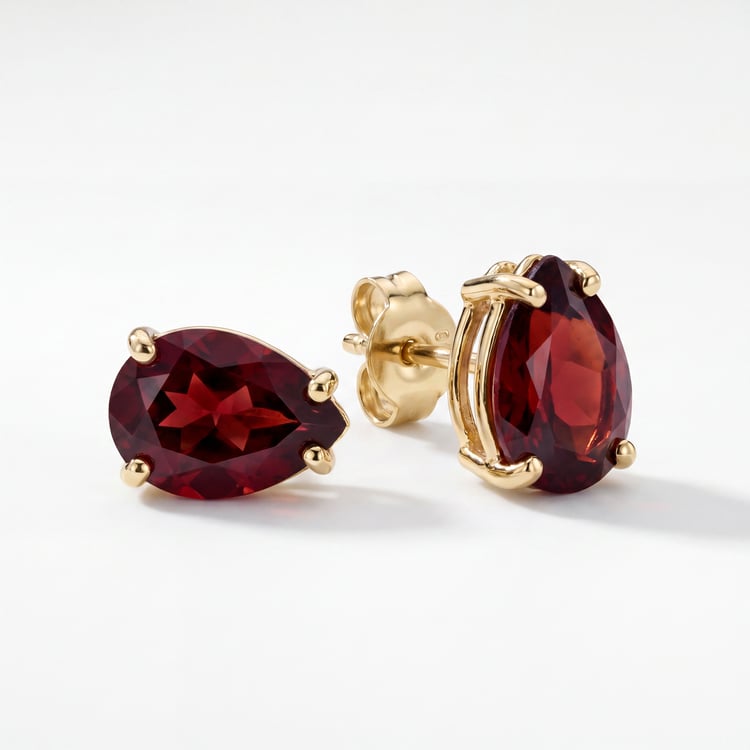 Goldene Ohrringe mit Pear Granat Reata 170459