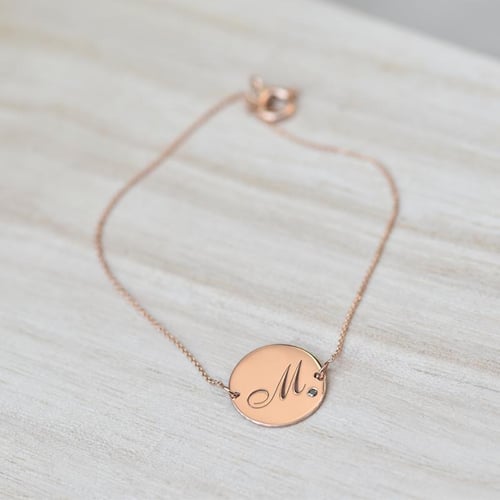 Armband aus Gold mit schwarzen Diamanten und Gravur Dian