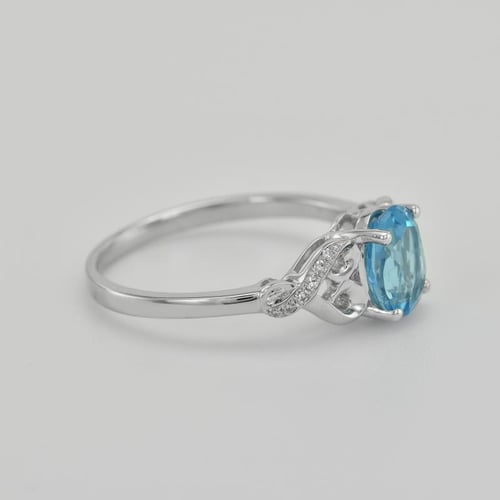 Goldring mit Blautopas und Diamanten Alanyse
