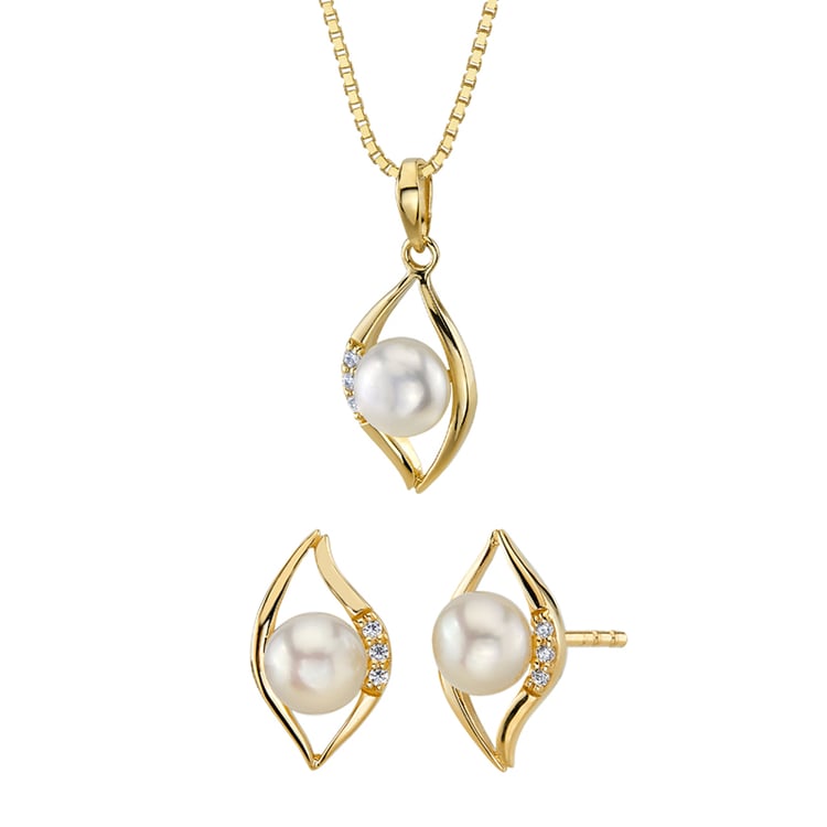 Goldene Schmuckkollektion mit weißen Perlen und Zirkonia Medea