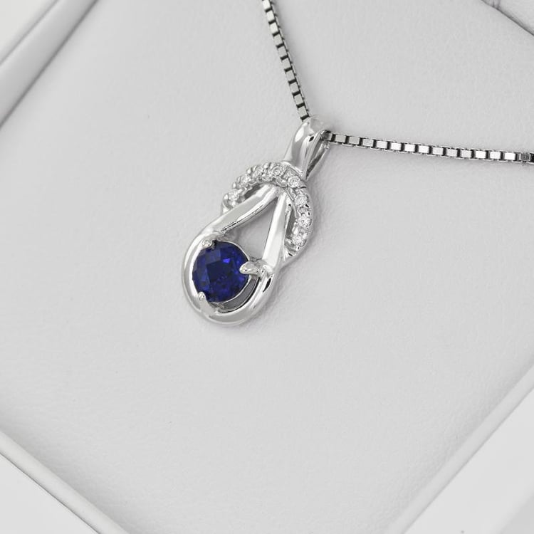 Silberanhänger mit blauem Saphir im Knotenmotiv Amadeni 9704