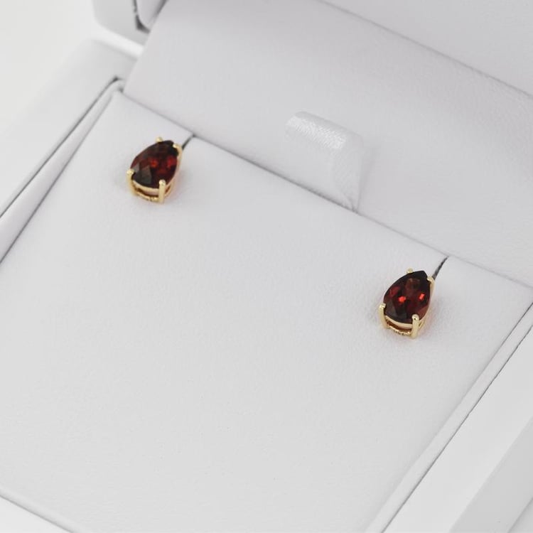 Goldene Ohrringe mit Pear Granat Reata 26406