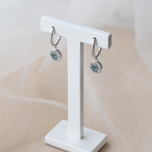 Goldene Ohrringe mit blauen Topasen und Diamanten Macy