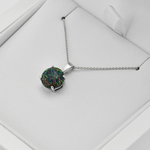 Schwarzer Opal im goldenen Anhänger Icy