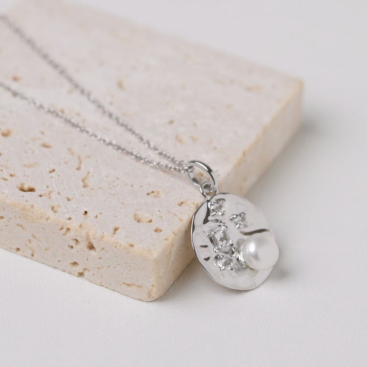 Silberner Perlenanhänger mit weißen Topasen 164033