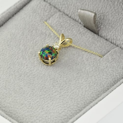 Schwarzes Schmuckset mit Opalen aus Gold Vanna