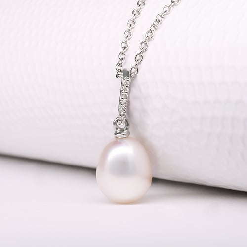 Goldenes Schmuckset mit Perlen und DIamanten Dudey