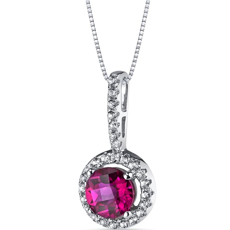 Rubinanhänger aus Gold mit Topasen geschmückt Umair