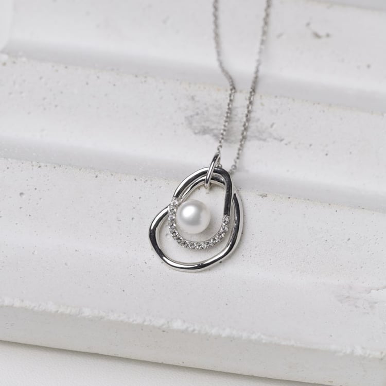 Silberner Perlenanhänger mit weißen Topasen 164021