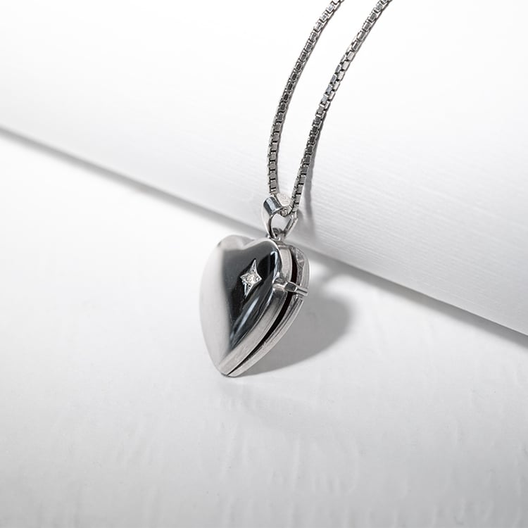 Medaillon aus Silber mit Diamant in Herzform 128637