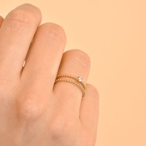 Schmuckset bestehend aus Ringen aus Kugeln und einem Diamanten Cullen