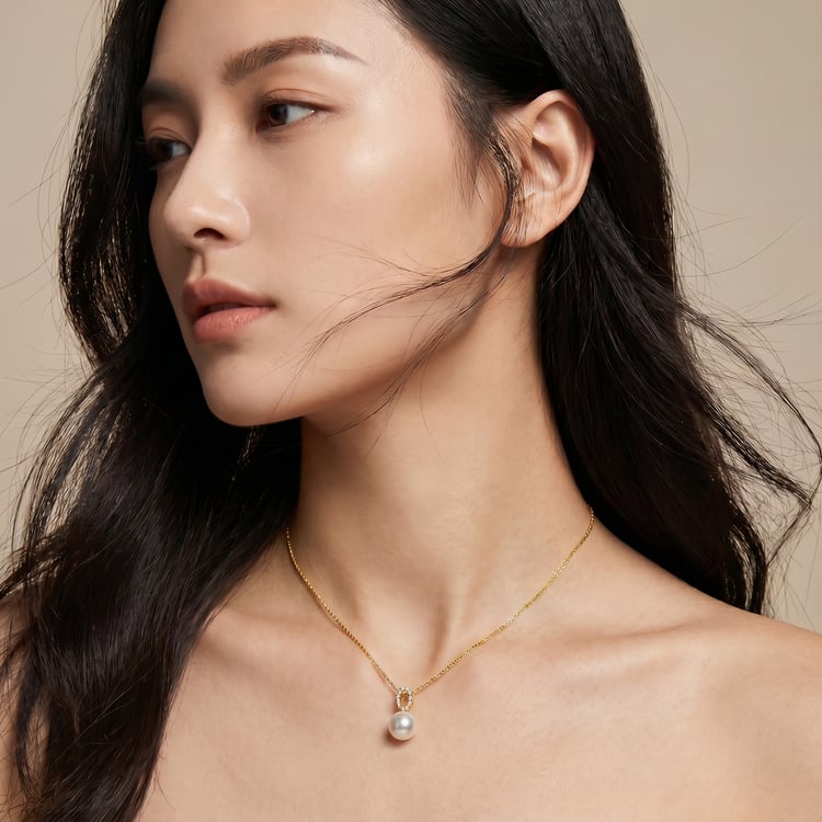 Eleganter goldener Anhänger mit Perle und Zirkonia Nana 167614