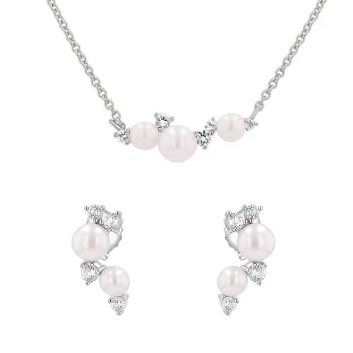 Silbernes Schmuckset mit Perlen und weißen Topasen Perlie