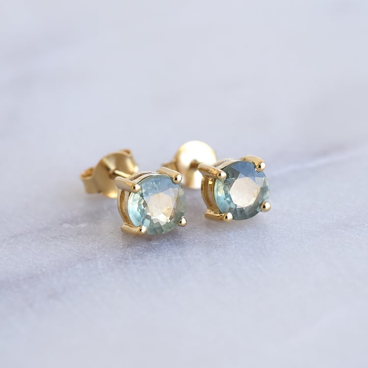 Silberne Ohrringe mit grünen Saphiren Conchur 86155