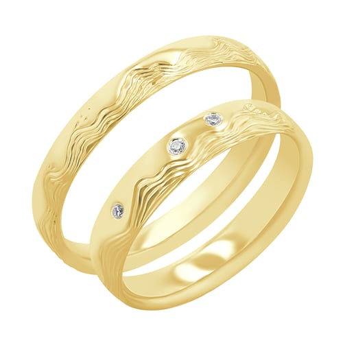 Eheringe mit von Hand gravierten Wellen und Diamanten Laurien
