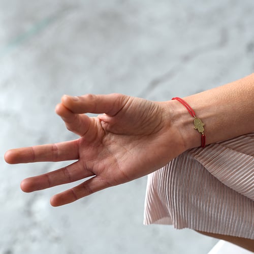String Armband mit dem Symbol Hamsa