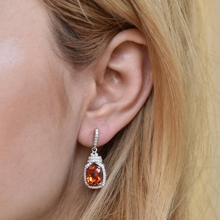 Silberne Ohrringe mit Saphiren 28525