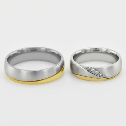 Eheringe aus mehrfarbihen Gold mit Diamanten Muze